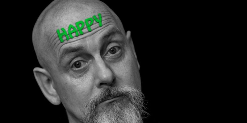 Jonathan Wilcock with the word 'HAPPY' on his forehead.